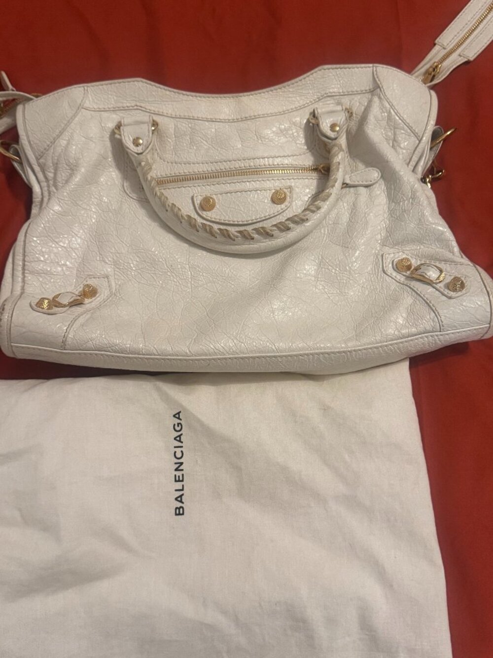 Authentic Balenciaga "Classic City" bag white with metal-edged golden hardware,